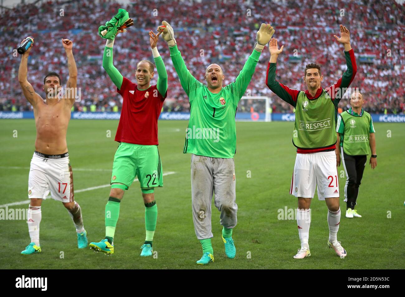 Hungary's Nemanja Nikolic, goalkeeper Peter Gulacsi, goalkeeper Gabor Kiraly and Barnabas Bese (left to right) celebrate in front of their fans after the final whistle  Stock Photo
