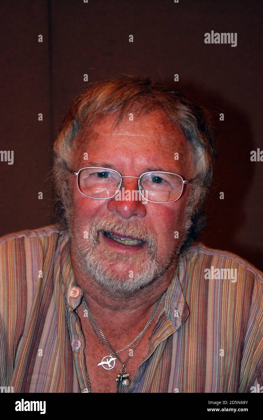 English actor, comedian, presenter, writer, and bird-watcher, Bill Oddie OBE, known for the classic British comedy, The Goodies, & BBC's Springwatch Stock Photo