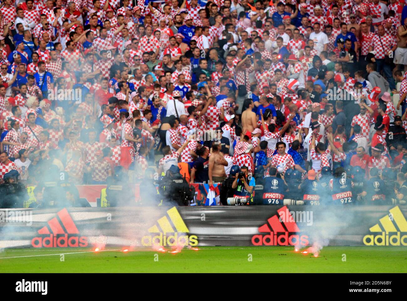 Croatia fans throw flares onto the pitch Stock Photo Alamy