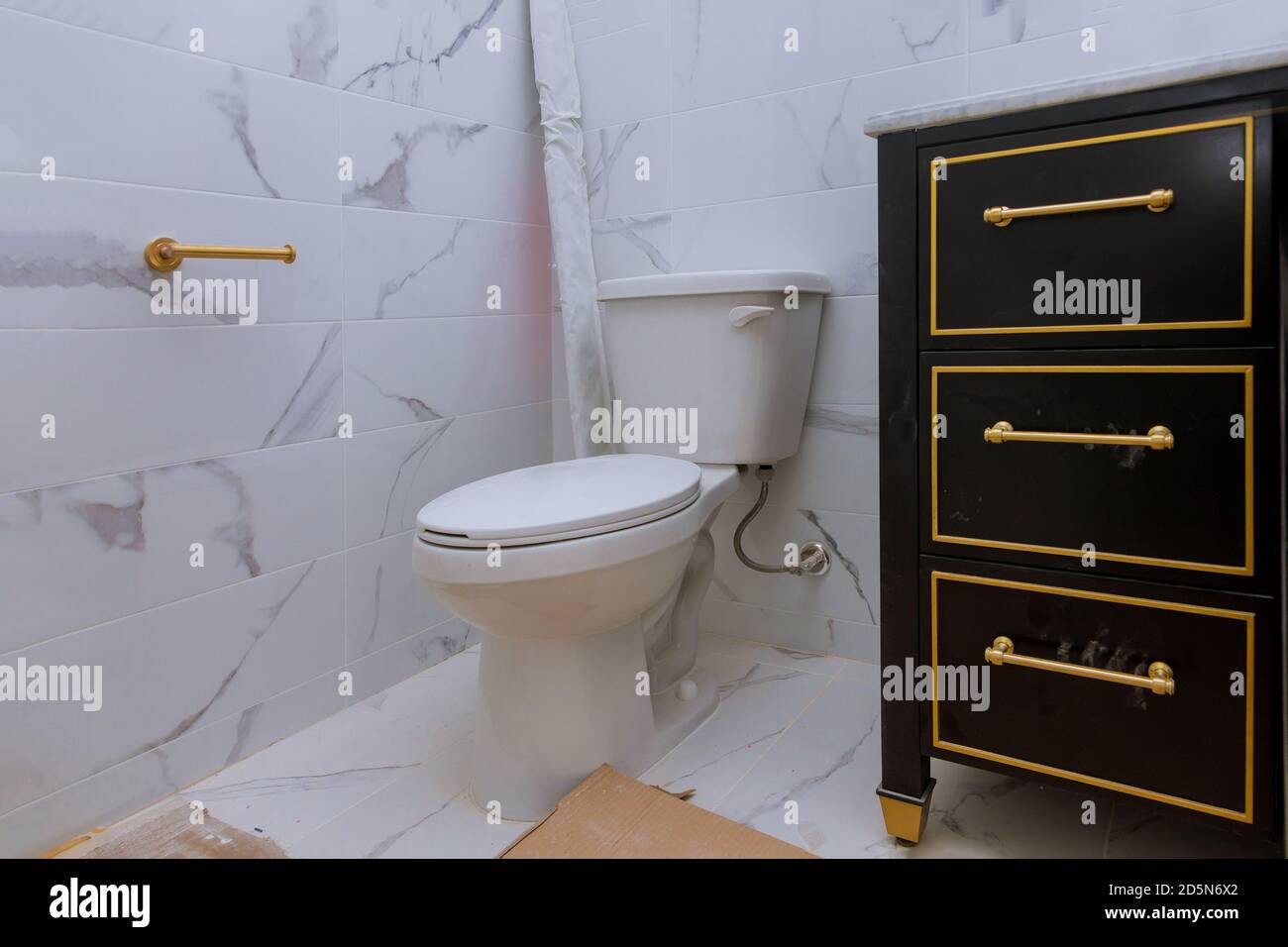 House renovation a bathroom with sink and toilet in the new house modern  interior of bathroom Stock Photo - Alamy
