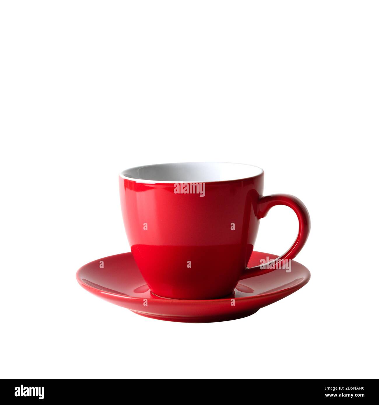 Red empty cup for coffee isolated on red background. Close up. Stock Photo