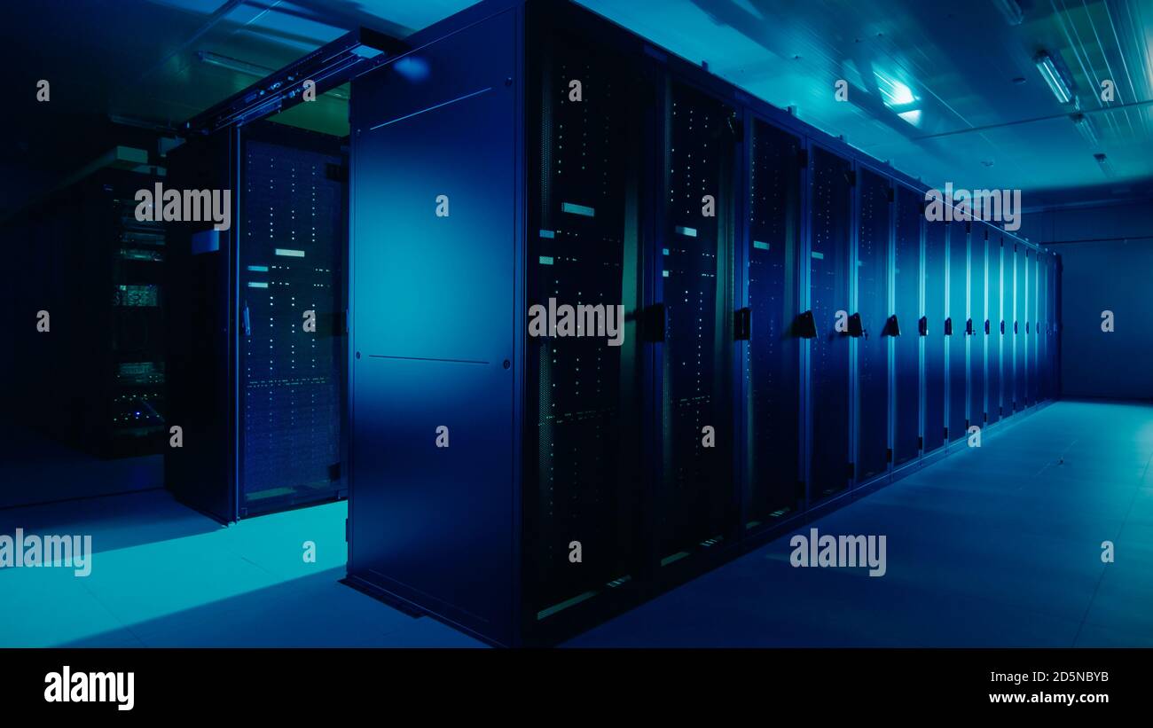 Shot of a Working Data Center With Rows of Rack Servers. Led Lights