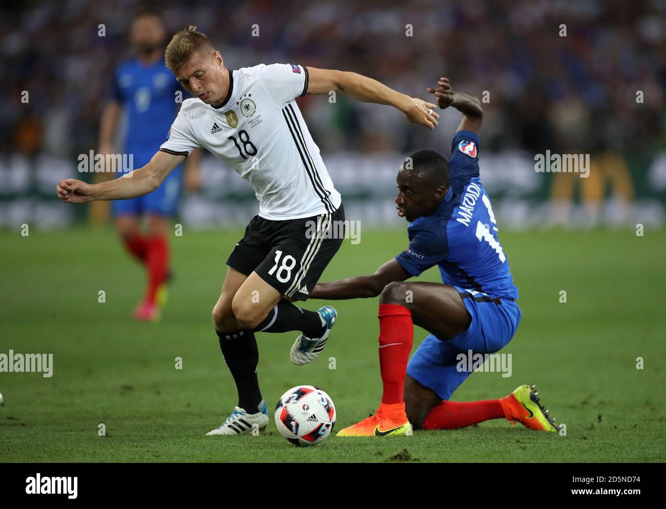 Germany's Toni Kroos (left)  and France's Blaise Matuidi in action Stock Photo