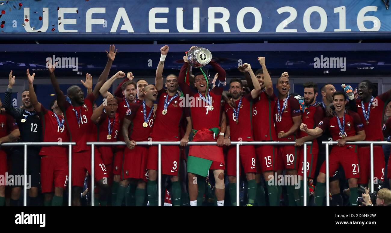 Portugal's Cristiano Ronaldo lifts the UEFA Euro 2016 trophy as