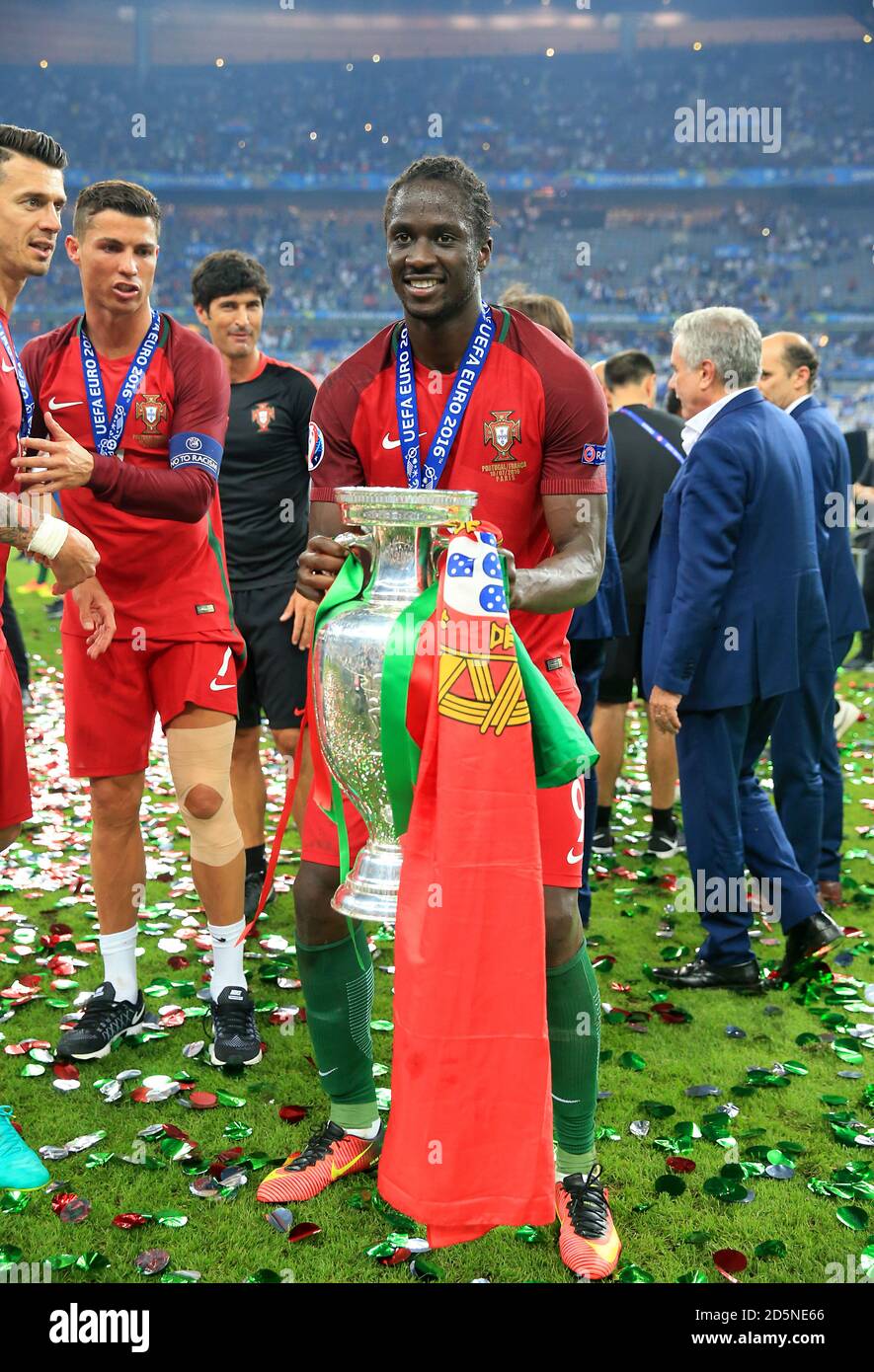 Portugal's Eder  celebrates with the trophy on the pitch after Portugal win the UEFA Euro 2016 final.  Stock Photo