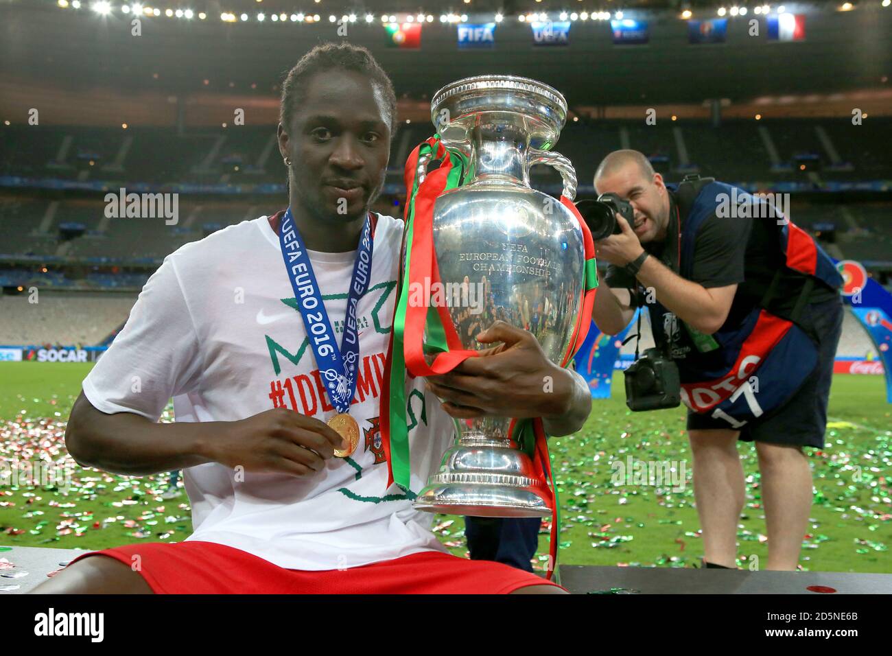 Portugal's Eder celebrates with the trophy after Portugal win the UEFA Euro 2016 final. Stock Photo