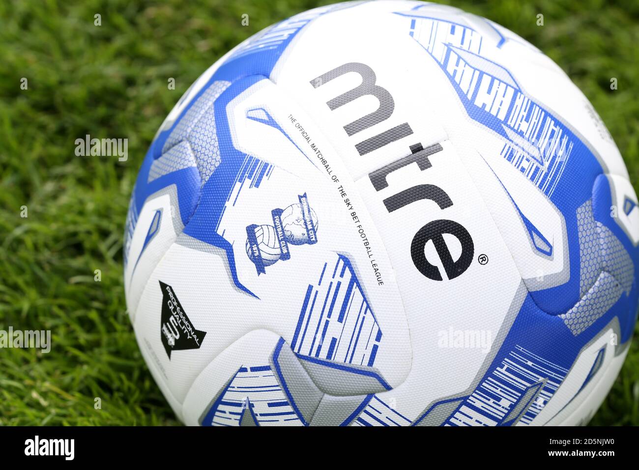 Mitre footballs on the pitch Stock Photo - Alamy