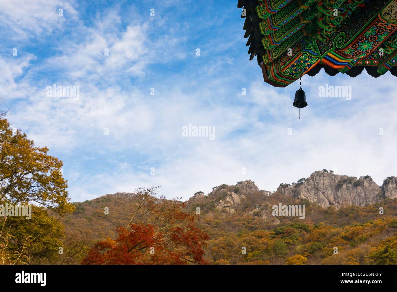 Autumn mountain and beautiful Korean temple roof landscape. Naejangsan National Park, South Korea. Stock Photo