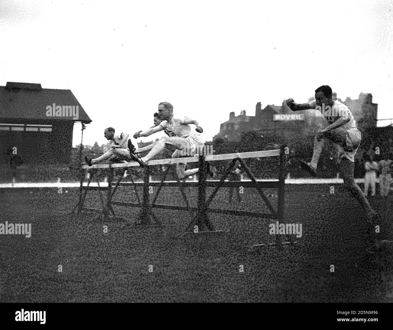 Lord Burghley leading over the first hurdle in the 120 yards hurdles race heat, which he won, in the Polytechnic Harriers athletic sports race at Stamford Bridge for the Kinnaird Trophy. *Glass plate is heavily corrupted. Stock Photo