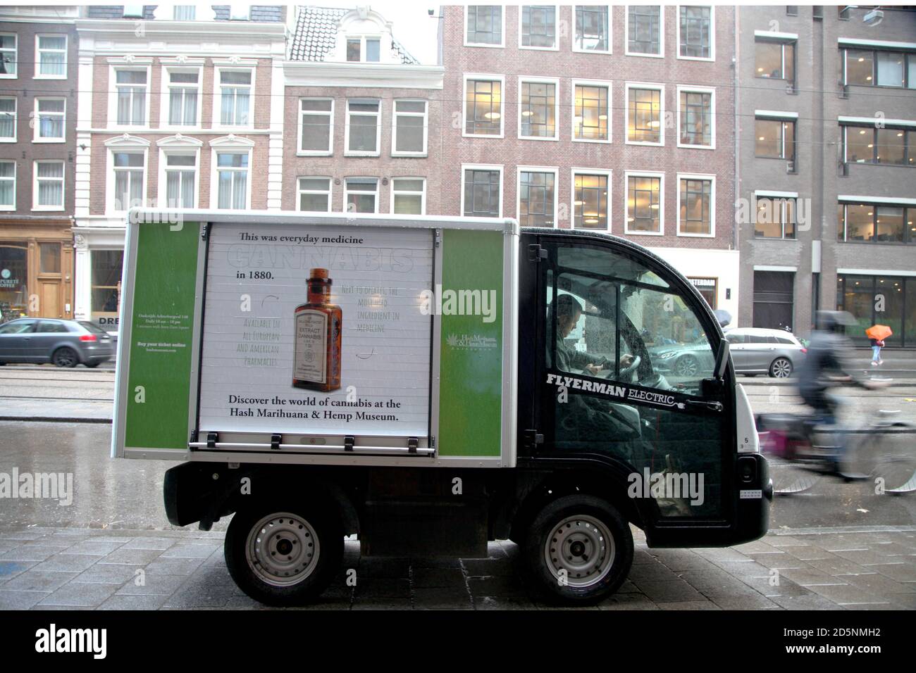 Van carrying advertisement for Hash Marihuana and Hemp Museum in Amsterdam Stock Photo