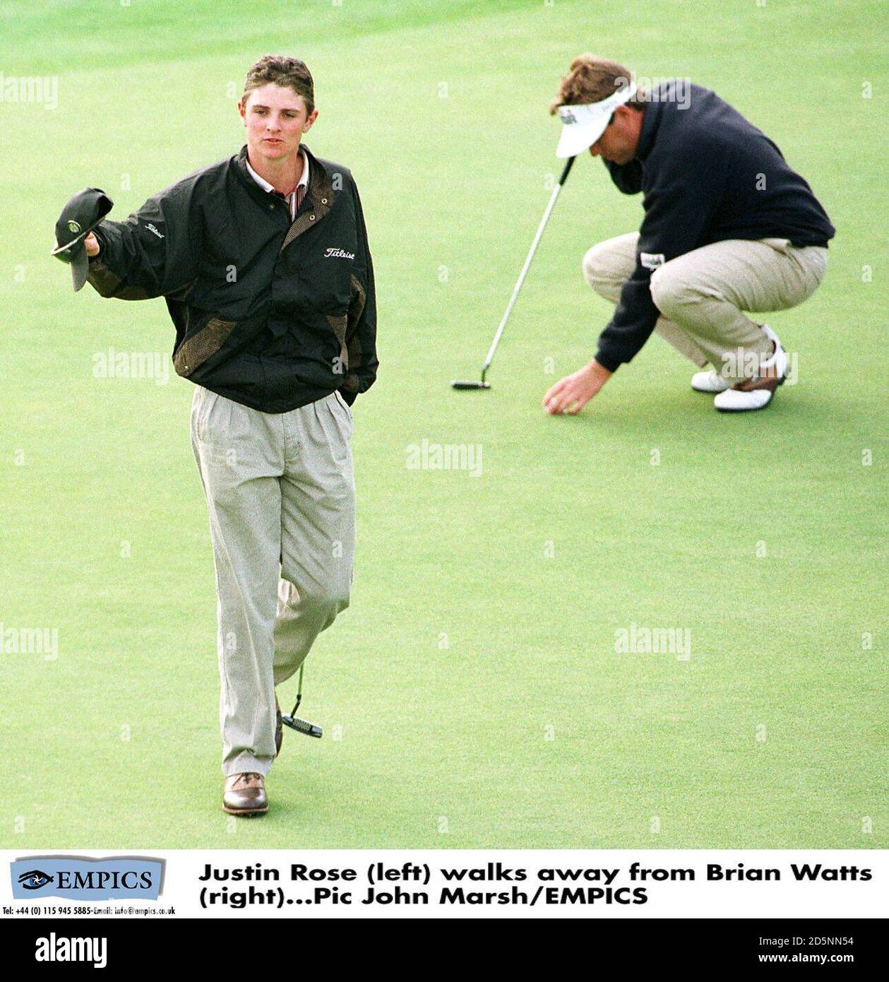 Justin Rose (left) walks away from Brian Watts (right Stock Photo Alamy