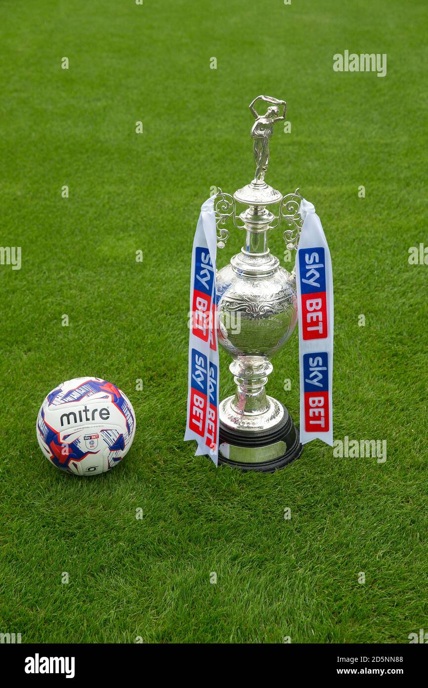 Detail of the Football League Championship trophy and the the official EFL Mitre match ball Stock Photo