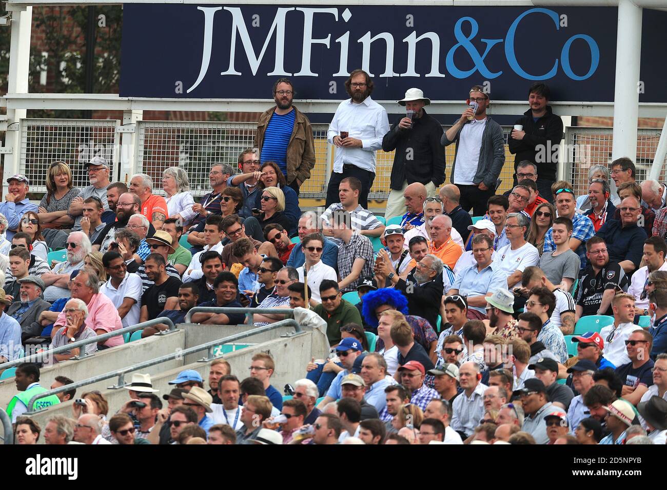Cricket fans watch the action at the Kia Oval Stock Photo