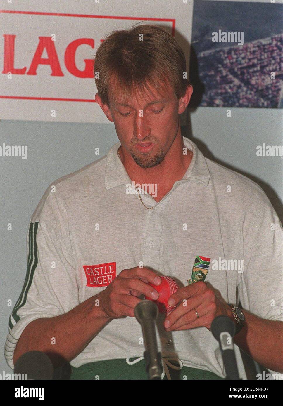 South Africa's Craig Matthews demonstrates his handling of the ball that brought some suspiscion of ball tampering during a press conference in Durban Stock Photo