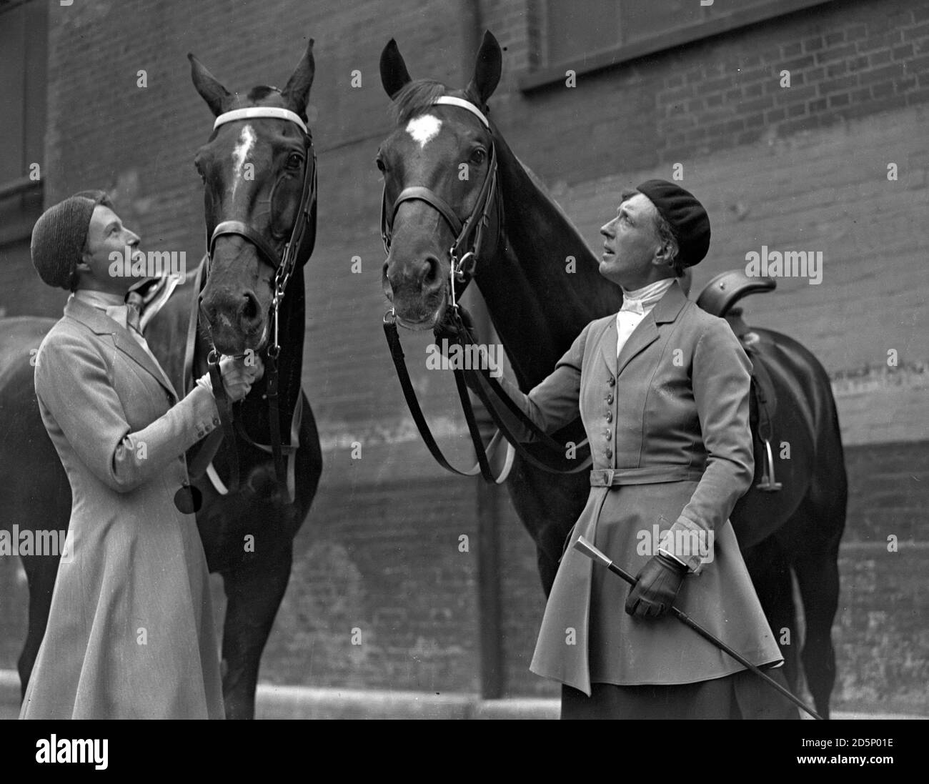 Frau Duensing (l) and Frau von Loebbecke, two German women competitors in the International Horse Show at Olympia, London. Stock Photo