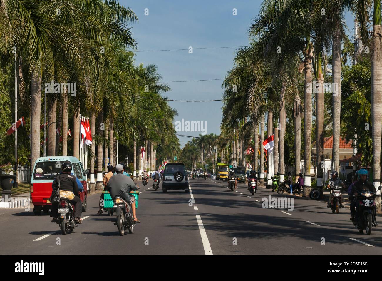 Horizontal view of the urban traffic on a road to Borobudur, Java ...
