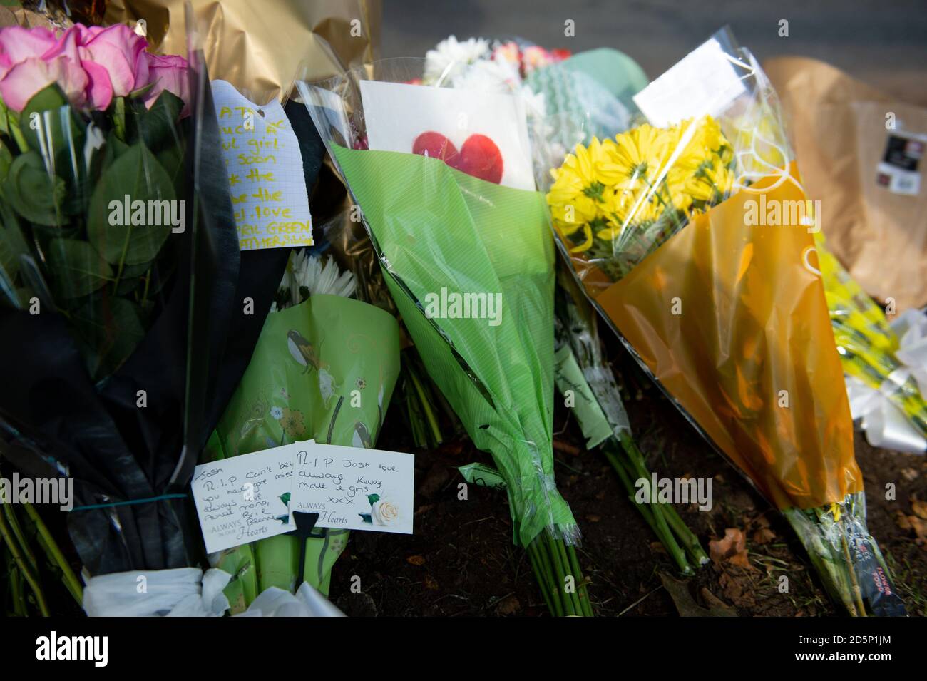 Tributes at the scene of a fatal crash on Bromley Lane in Kingswinford