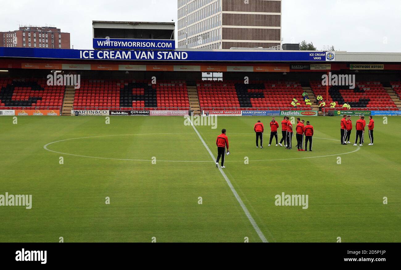 Doncaster Rovers team inspect the pitch prior to the Sky Bey League 2 game between Crewe Alexandra and Doncaster Rovers. Stock Photo