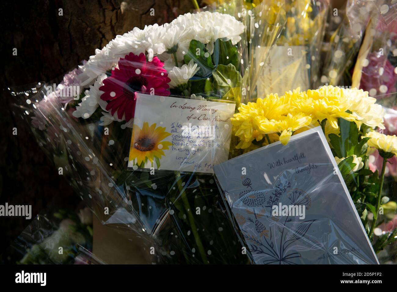Tributes at the scene of a fatal crash on Bromley Lane in Kingswinford