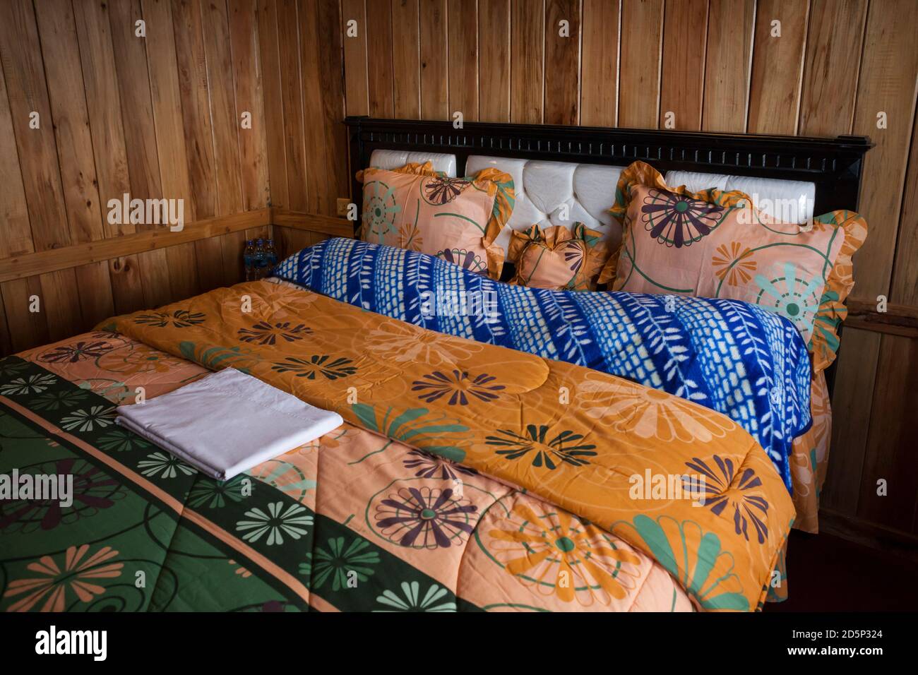 Horizontal view of a Cemara Indah Hotel bedroom, Cemara Lawang, Java, Indonesia Stock Photo