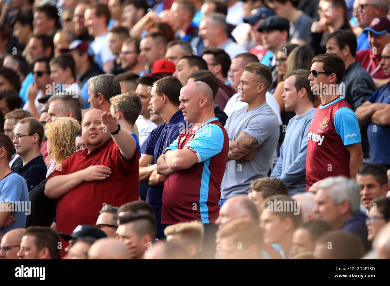 West Ham United fans standing in the stands during the game Stock Photo -  Alamy