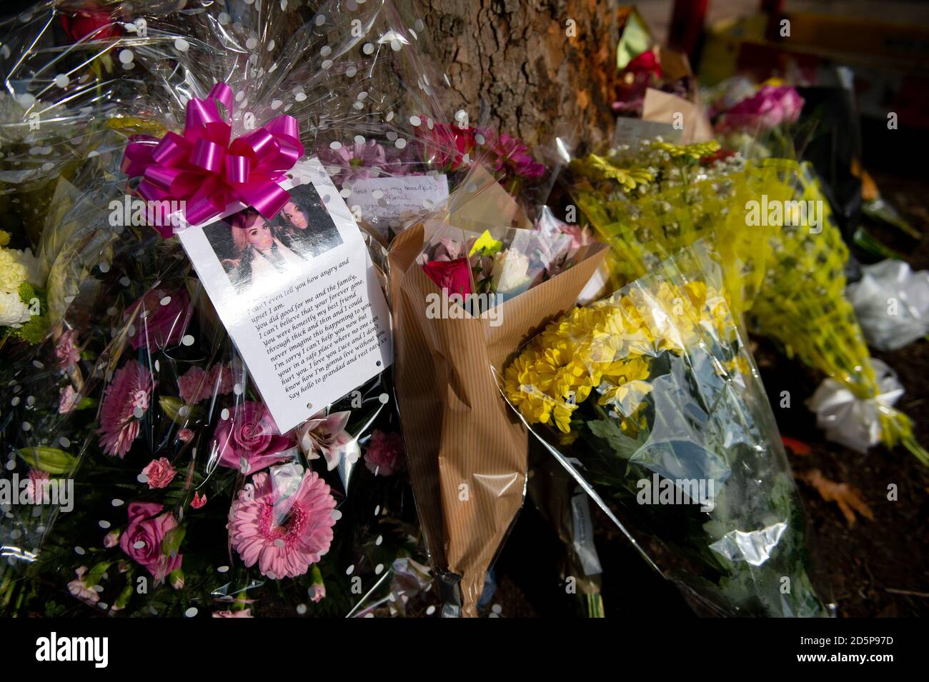 Tributes at the scene of a fatal crash on Bromley Lane in Kingswinford