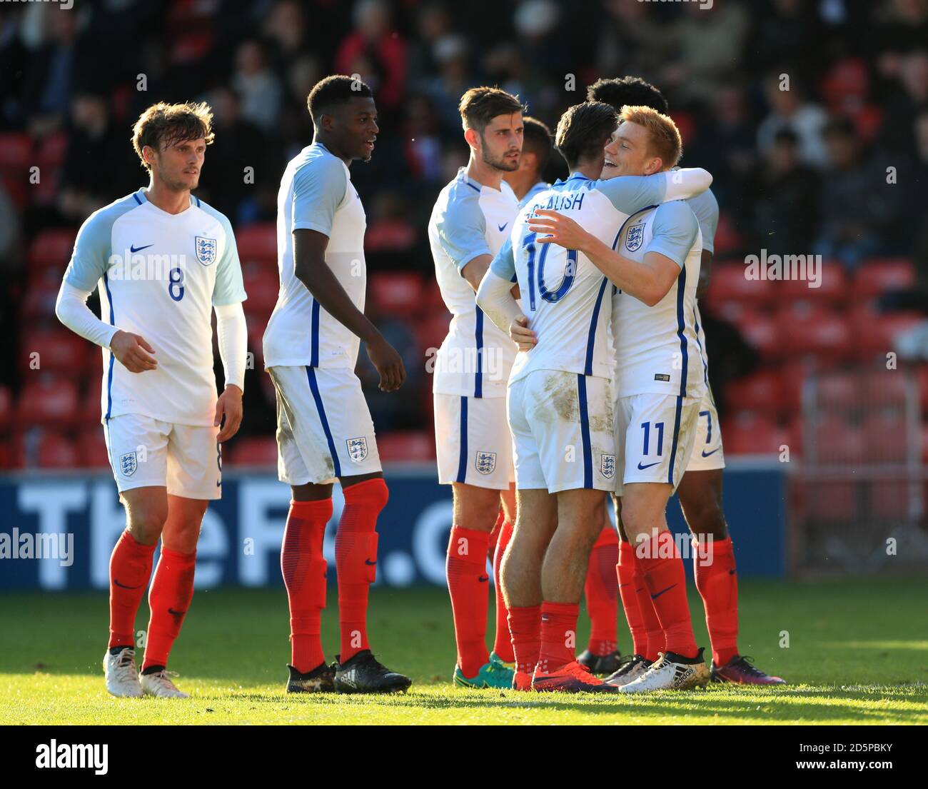 England's Duncan Watmore (right) celebrates scoring his side's fourth goal of the game Stock Photo