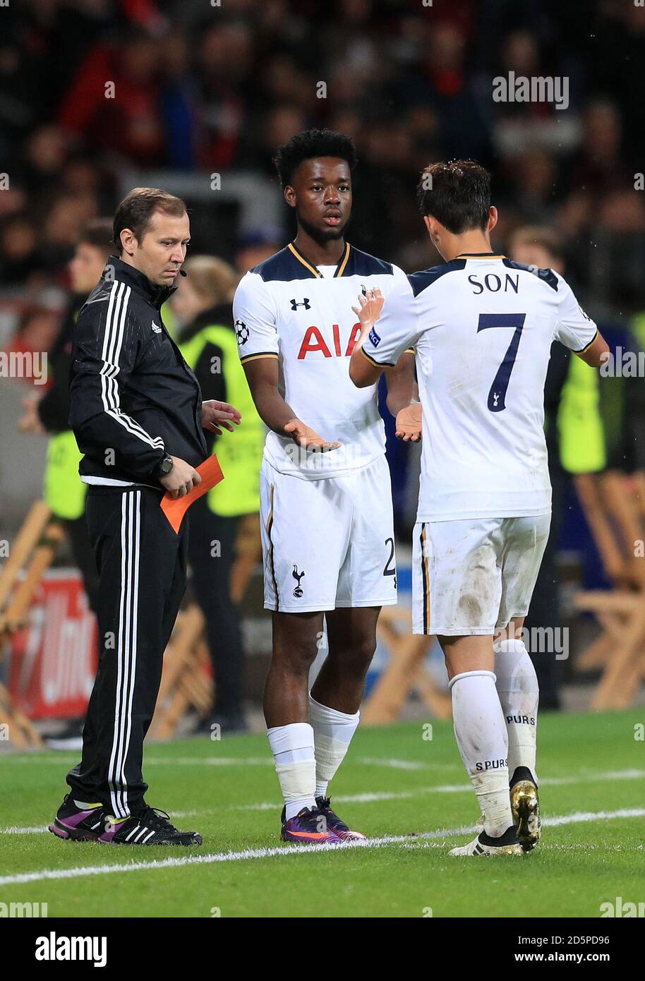 Tottenham Hotspur's Son Heung-Min (right) is replaced by Tottenham Hotspur's Joshua Onomah  Stock Photo