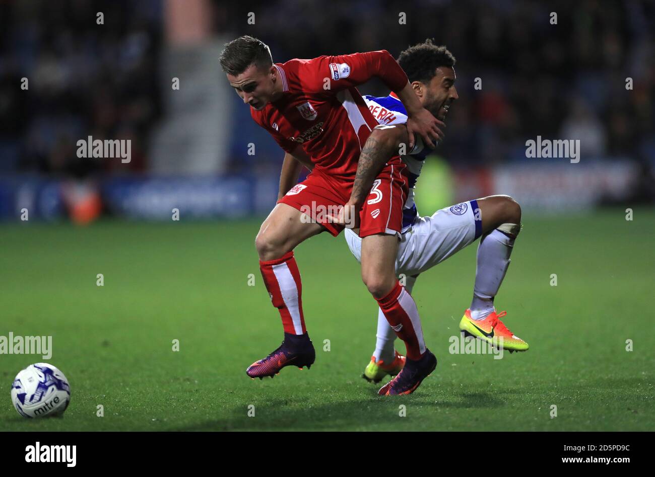 Bristol City's Joe Bryan, (left) battles for the ball with Queens Park Rangers' James Perch, (right) Stock Photo