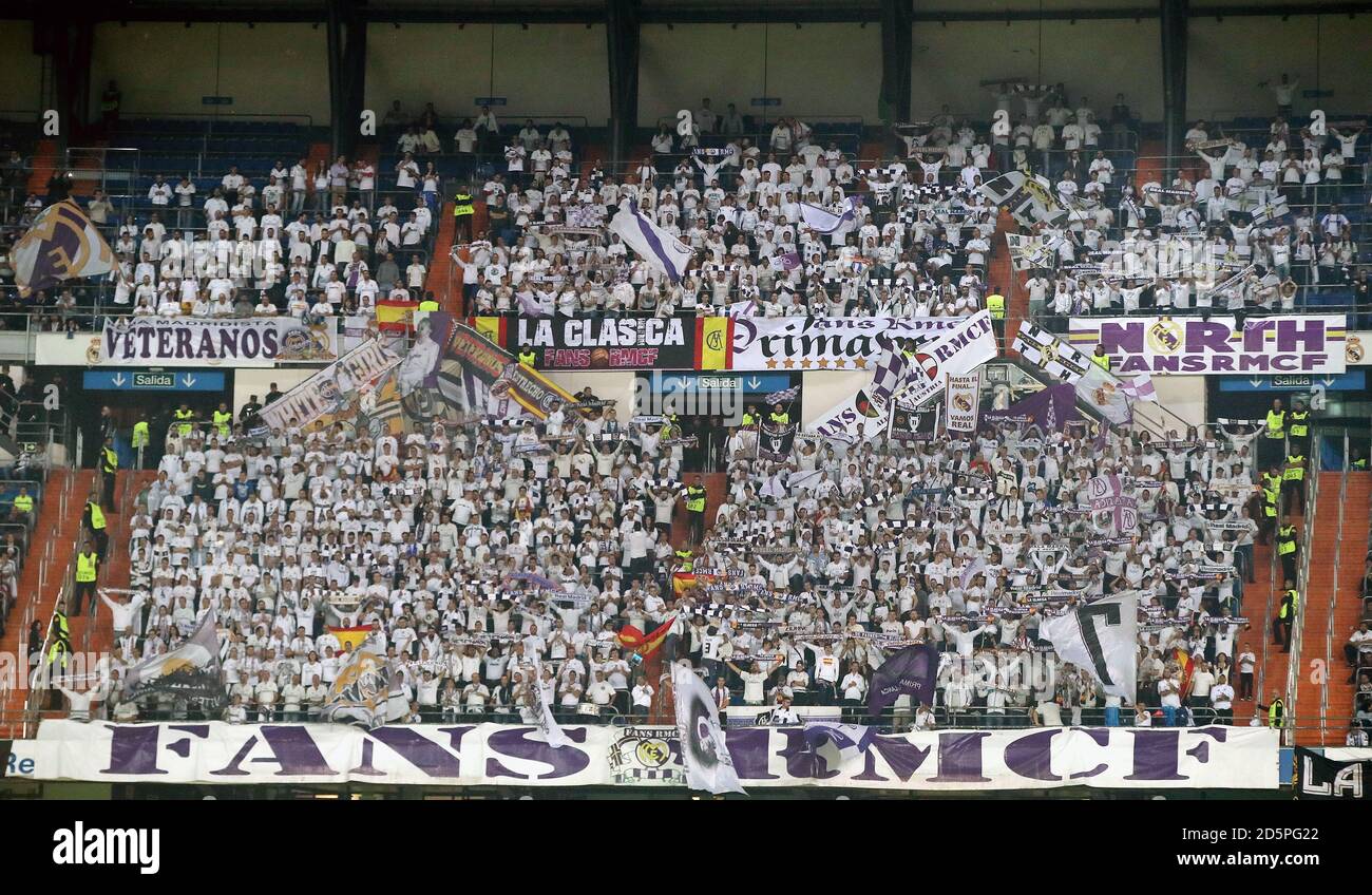 Real Madrid fans in the stands show their support Stock Photo - Alamy