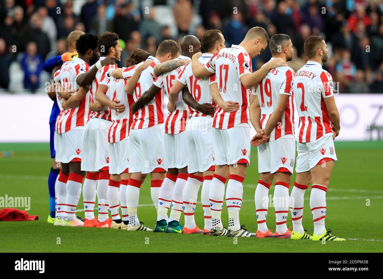 Stoke City players observe a minute s silence for Rememberance Day before the game Stock Photo Alamy