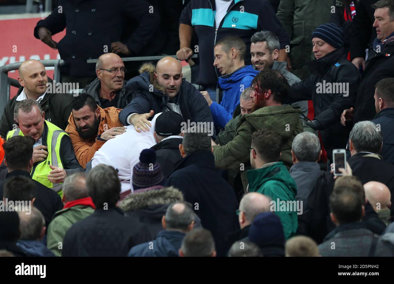 England fans fight in the stands Stock Photo Alamy