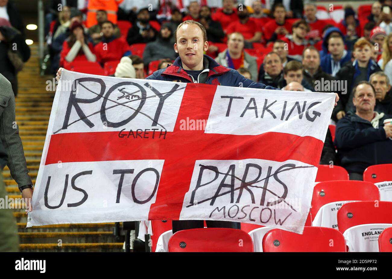 An England fan holds a flag in the stands at Wembley Stadium before the ...