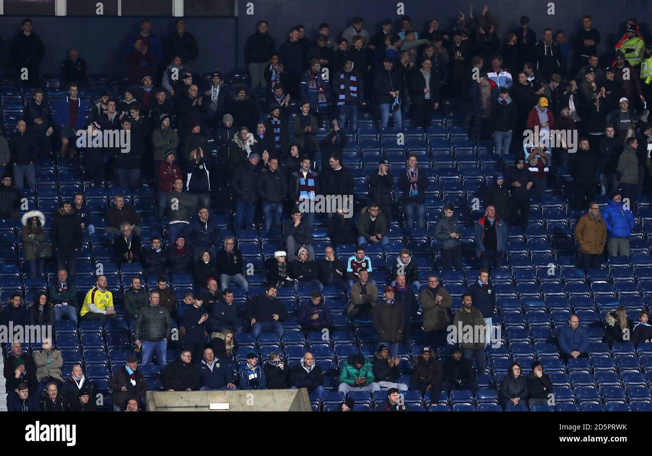 Burnley fans in the away end of the ground Stock Photo Alamy