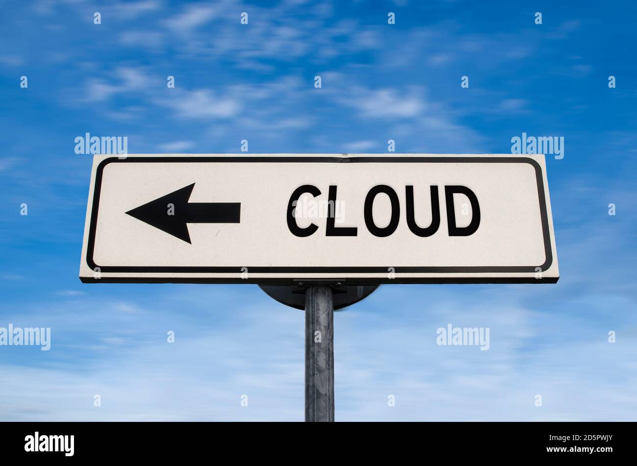 Cloud road sign, arrow on blue sky background. One way blank road sign with copy space. Arrow on a pole pointing in one direction. Stock Photo