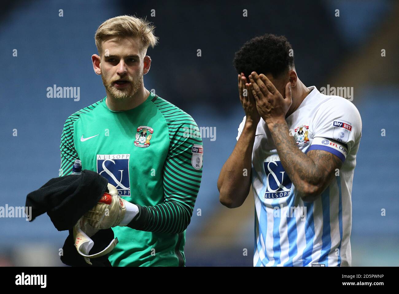 Coventry City's captain Jordan Willis looks dejected at the end of the game  against Milton Keynes Dons with keeper Lee Burge Stock Photo - Alamy