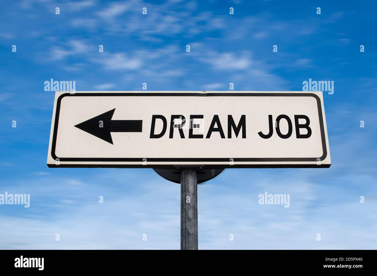 Dream job road sign, arrow on blue sky background. One way blank road sign with copy space. Arrow on a pole pointing in one direction. Search for bett Stock Photo