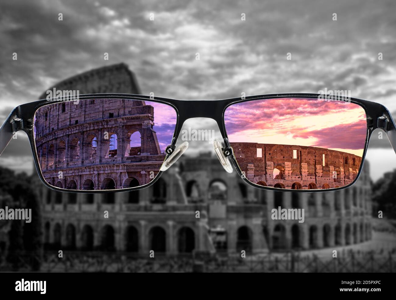 Looking through glasses to colorful Colosseum (Coliseum) in Rome at sunset against purple cloudy sky, Italy. Different world perception. Optimism. Stock Photo