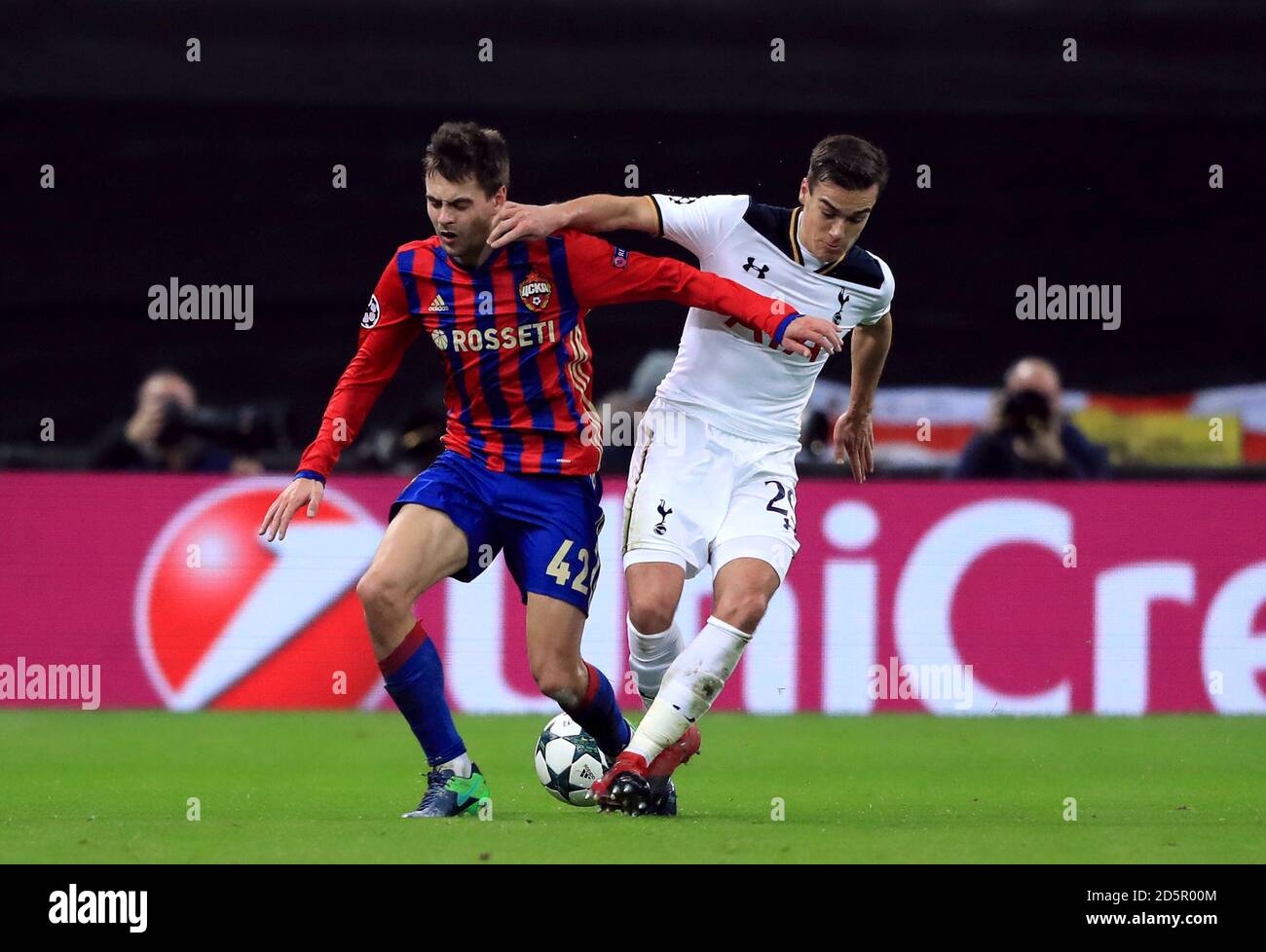 CSKA Moscow's Georgi Schennikov (left) and Tottenham Hotspur's Harry Winks battle for the ball Stock Photo