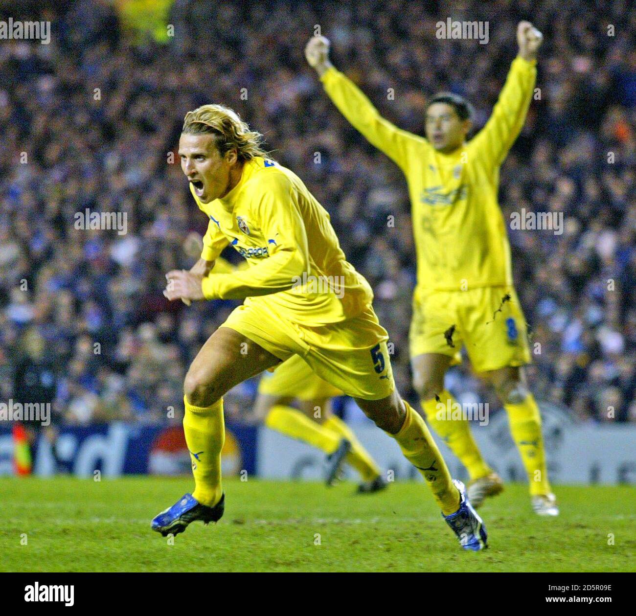 Diego Forlan celebrates after scoring Villarreal's 2nd goal