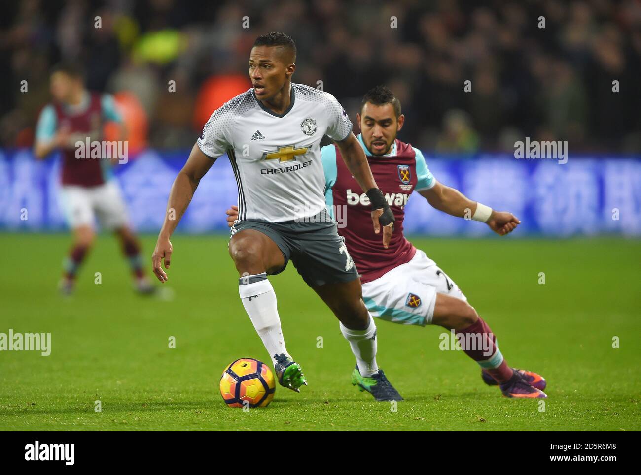 Manchester United's Luis Antonio Valencia (left) and West Ham United's Dimitri Payet in action Stock Photo
