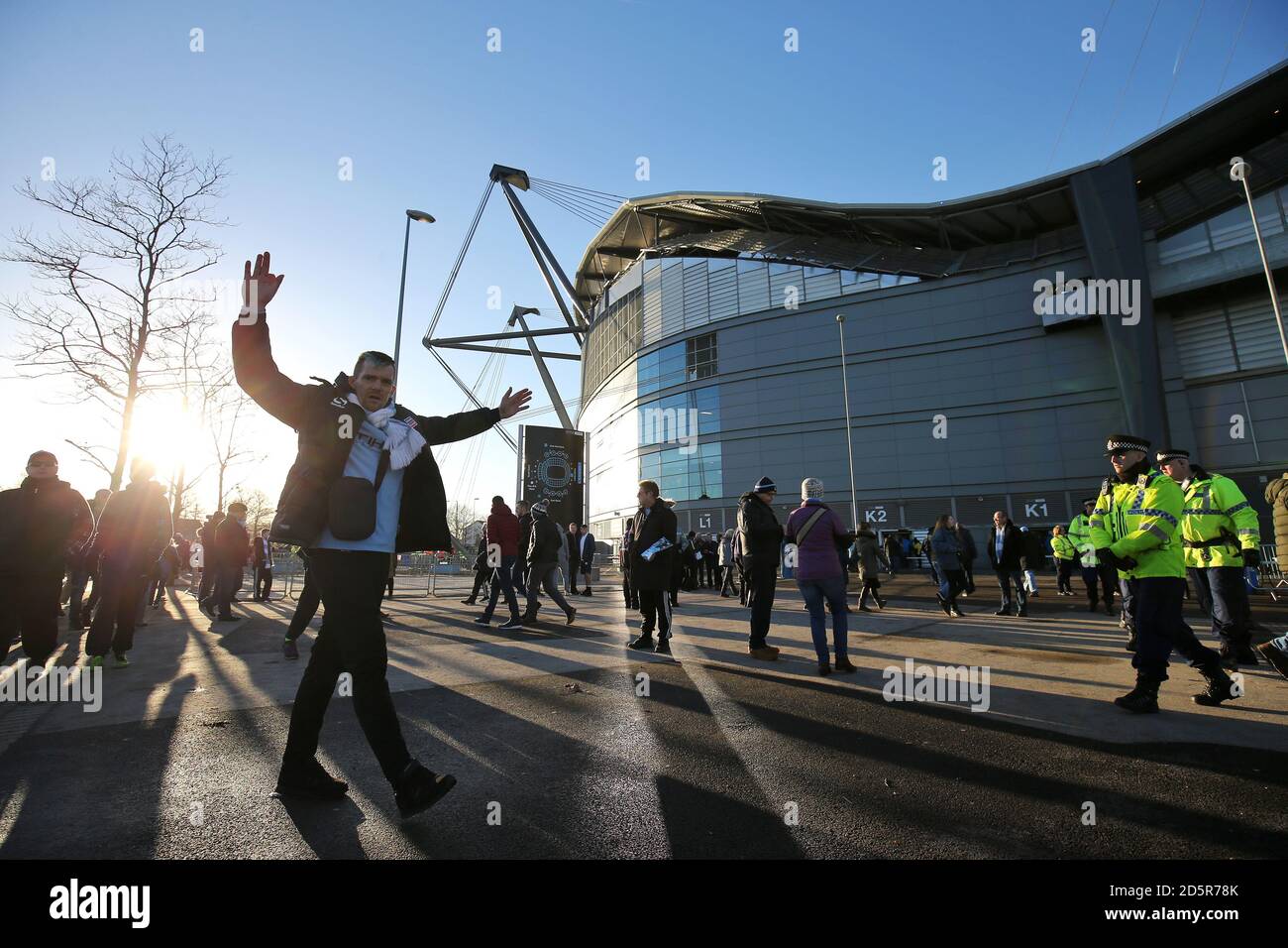 Fans outside the Etihad Stadium before the game Stock Photo