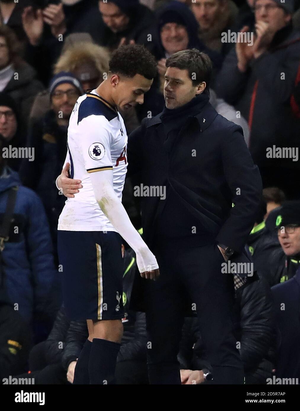 Tottenham Hotspur manager Mauricio Pochettino congratulates Tottenham Hotspur's Dele Alli as he is substituted off  Stock Photo