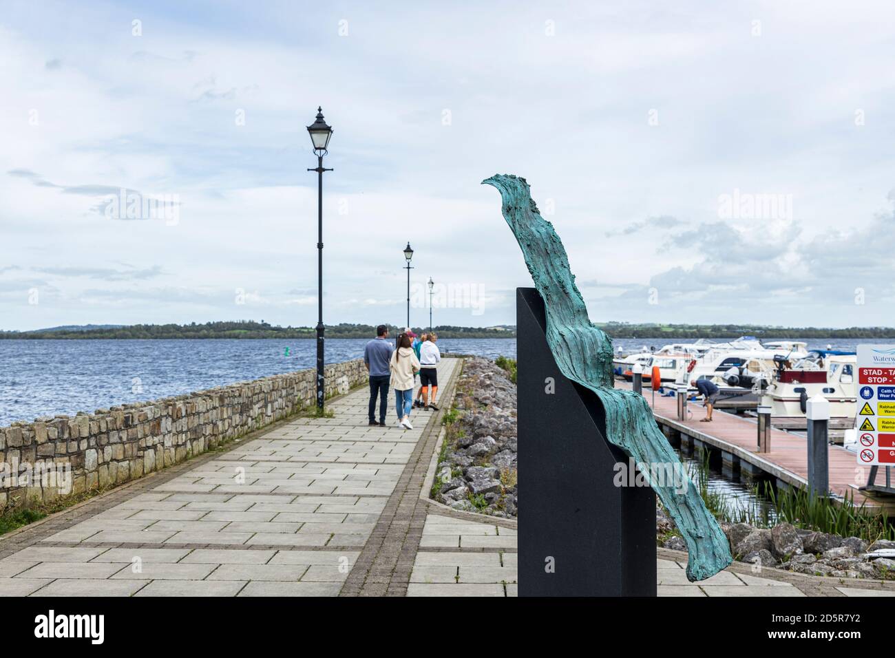 Bronze wave sculpture, artwork at the moorings on Lough Derg at Garrykennedy, County Tipperary, Ireland Stock Photo