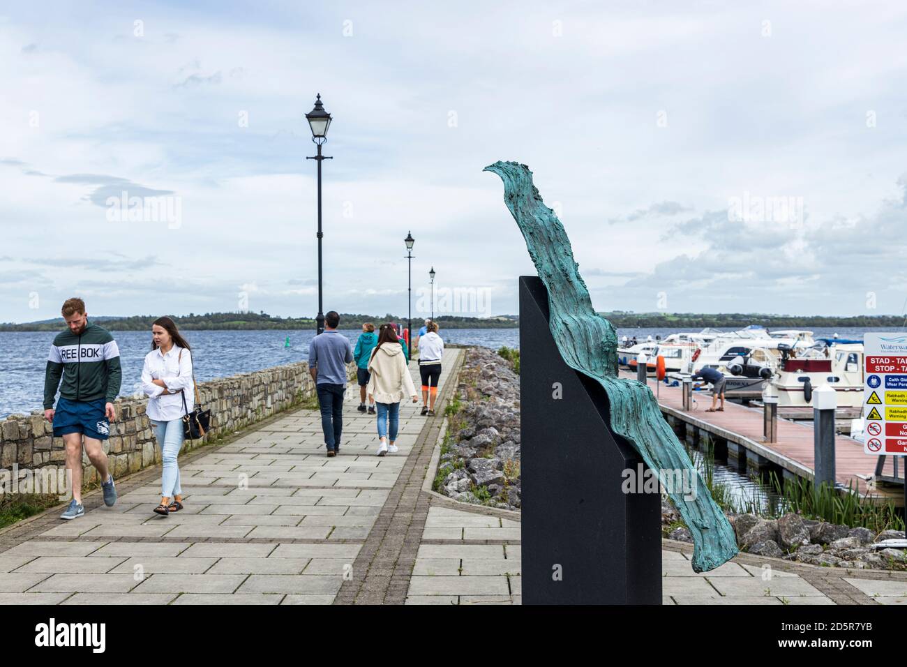 Bronze wave sculpture, artwork at the moorings on Lough Derg at Garrykennedy, County Tipperary, Ireland Stock Photo