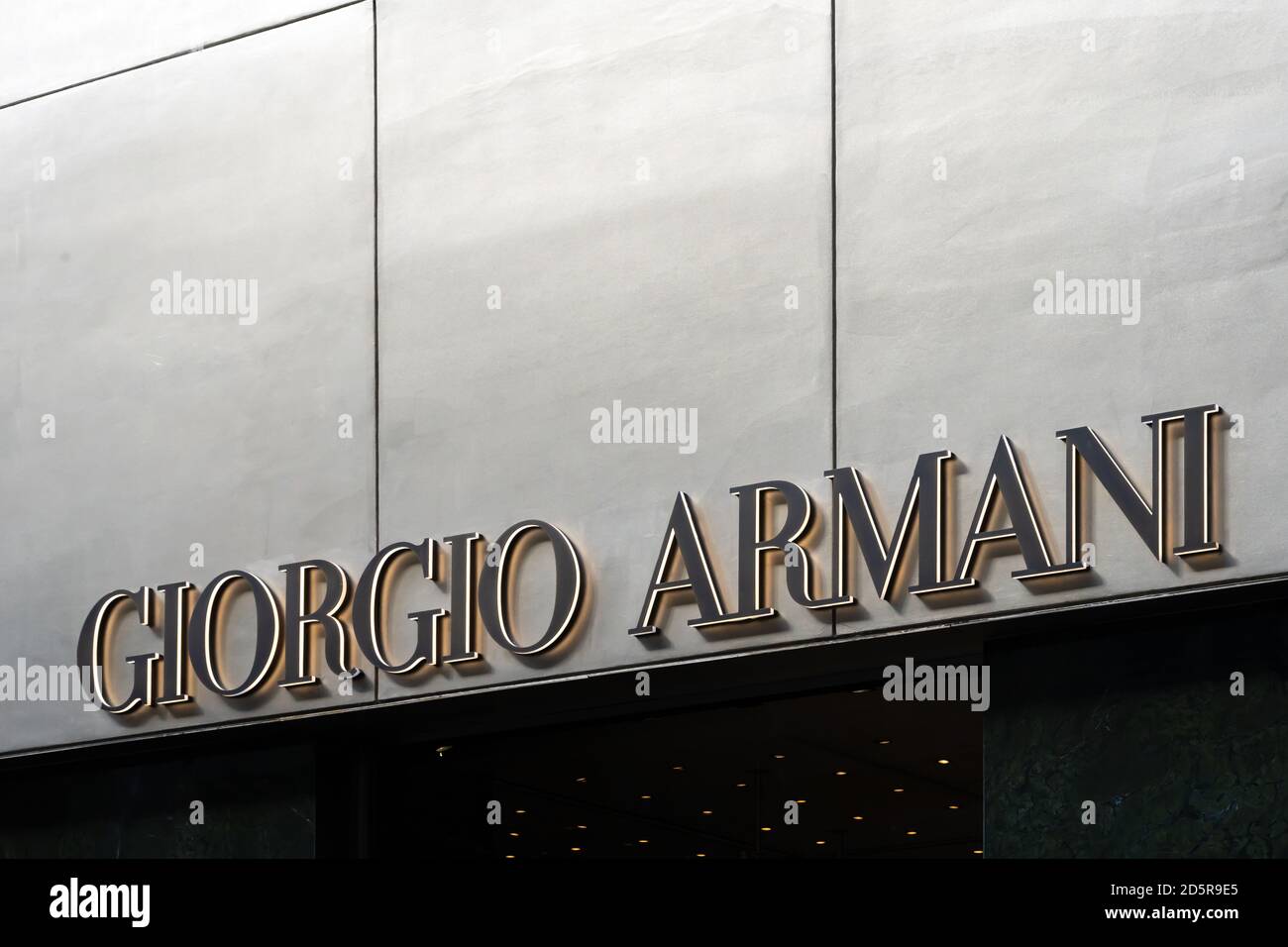 Giorgio Armani logo of store in Milans Fashion District. Montenapoleone  area. Giorgio Armani is a high-end label specializing in accessories,  glasses, cosmetics. Milan, Italy - 24.09.2020 – Stock Editorial Photo ©  photo-lime #418068596