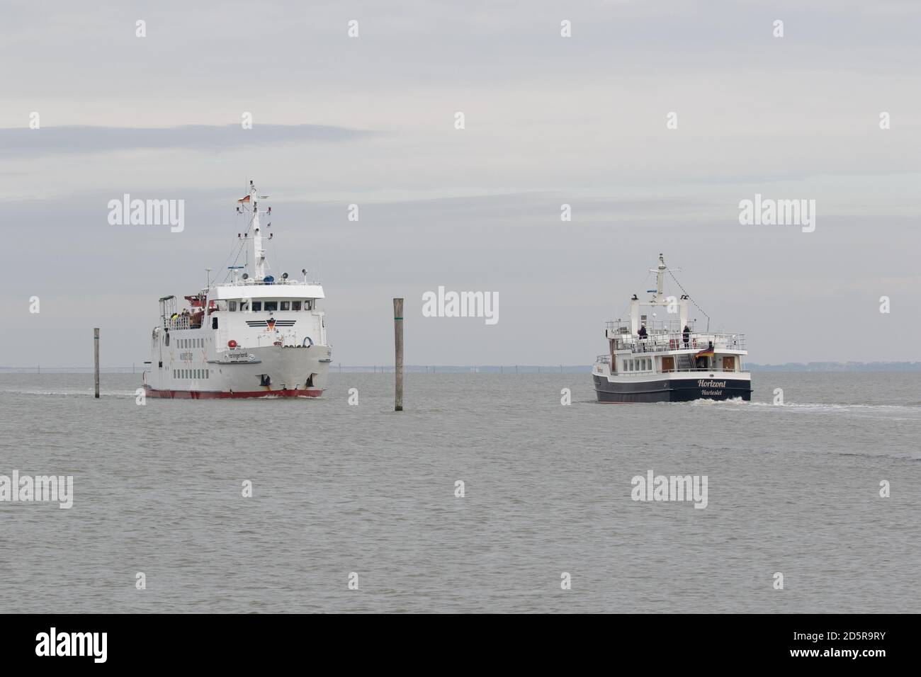 Ferries sailing to and from the Fresian Islands. October 2020. Lower Saxony. Germany Stock Photo