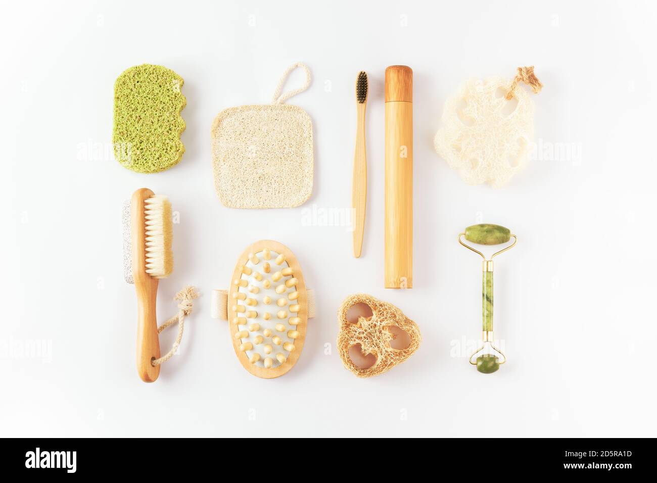 Ecology, zero waste concept. Reusable items for beauty treatment from organic biodegradable material, quartz face roller, anti cellulite massager Stock Photo