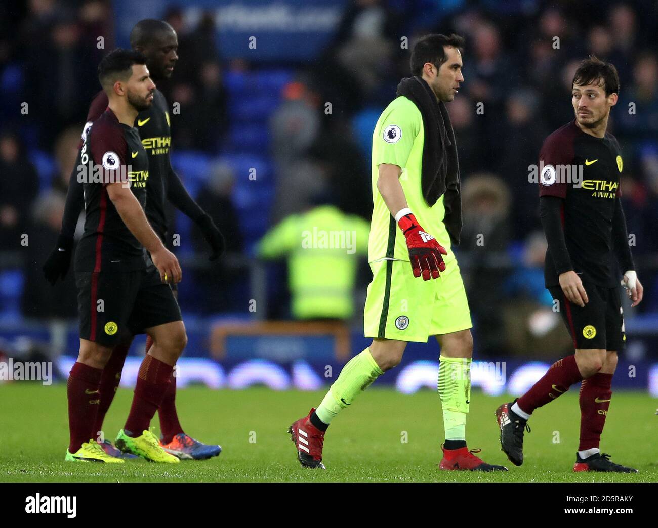 Manchester City's Sergio Aguero (left), Manchester City goalkeeper Claudio Bravo (centre) and Manchester City's David Silva (right) appear dejected after the final whistle Stock Photo