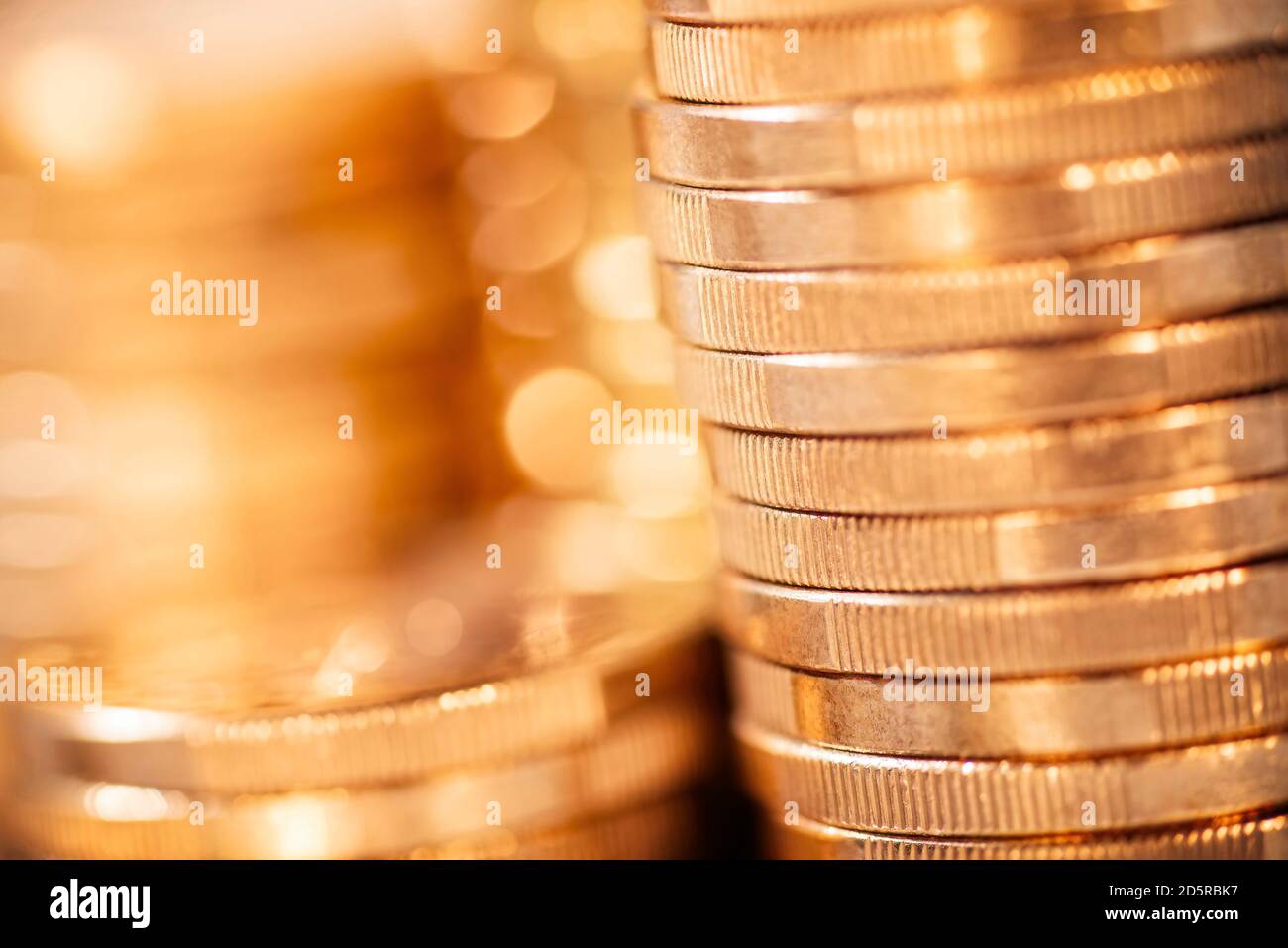 Detail of several stacks of coins Stock Photo